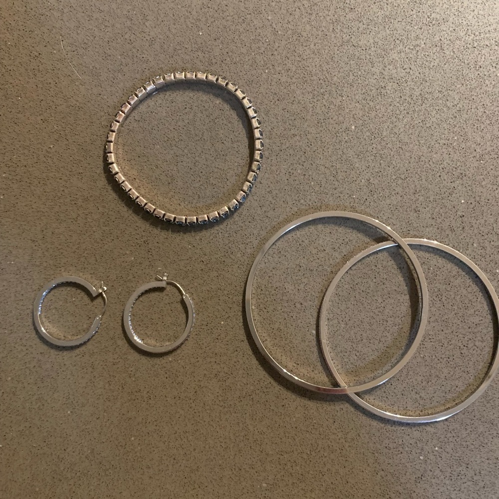 Swarovski Crystal jewelry set, includes 3 bracelets and one set of hoop earrings